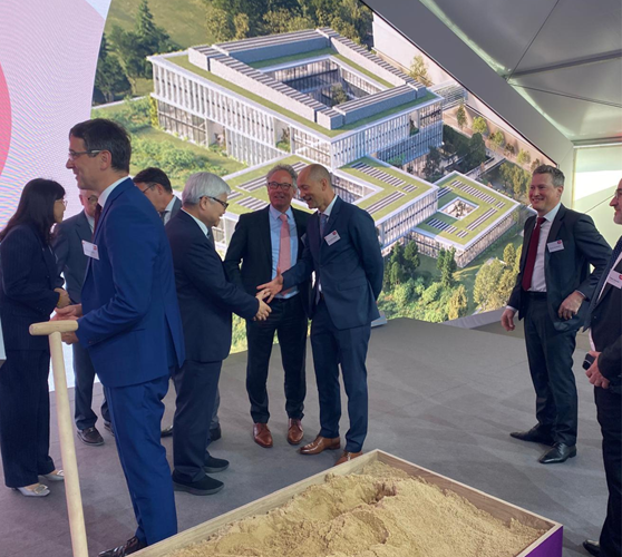 a group of people standing in front of a building